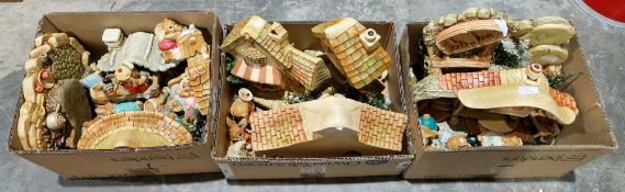Three boxes of Pendelfin figures, cottages, shops, large circular pebble cast base and assorted