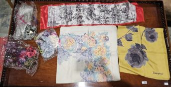 Liberty all silk floral decorated scarf, a Jacqmar rose decorated silk scarf and another, a quantity