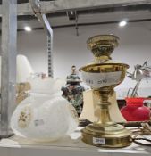 Brass oil lamp with opaque glass floral decorated shade and chimney