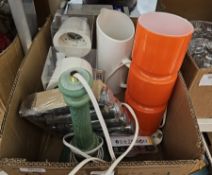 Modernist-style orange case glass table lamp, two Skeninge IKEA lights, a white ceramic jug and