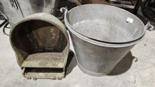 Galvanised metal bucket and an unusual cast iron wall-mounted water vessel comprising a bowl fed