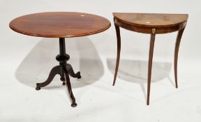 19th century mahogany tilt-top table, the oval top on a turned pedestal support with three splayed
