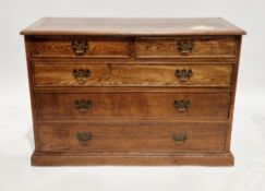 Early 20th century oak chest of drawers, the rectangular top with thumbmould edge over two short and