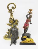 Brass doorstop, cast in the form of Bacchus in the rococo manner with a foliate scrolling handle,