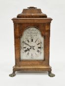 George II-style walnut bracket clock, the case with ogee caddy top and brass swing handle, glass