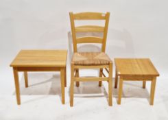 Pine nest of two tables of rectangular form, on square legs, largest 46cm high x 51.5cm wide and a