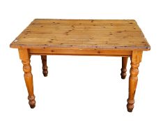 20th century pine breakfast table of rectangular form, on turned legs, 76cm high x 120cm wide x 80cm