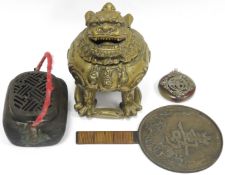 Chinese gilt-bronze incense burner in the form of a stylised mythical beast, with hinged head