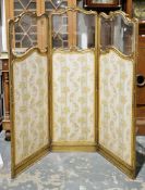 19th century French giltwood three-fold dressing screen, of rococo style shaped outline with foliate
