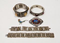 Two silver brooches including a presentation brooch with an oval Murano glass panel surrounded by