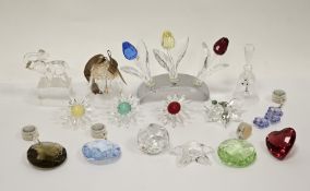 Collection of Swarovski crystal glass ornaments including three tulips on stand, two bells,