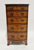 Early 20th century bowfronted chest of drawers in the Regency manner, the top with ogee moulded edge