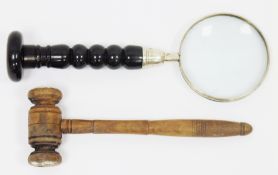 Hand held magnifying glass with horn bobbin turned handle, 29cm long together with a turned wooden