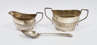George V silver milk jug and sugar bowl, Chester 1910, Barker Brothers, with part fluted bodies,