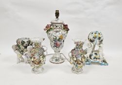 Pair of English porcelain Coalbrookdale-type vases, circa 1835, of baluster form, flower encrusted