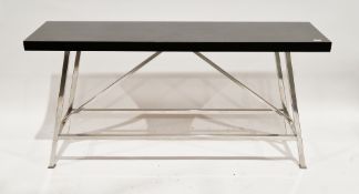 Contemporary lacquered hardwood console table, the rectangular top in a polished white metal base,