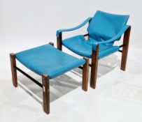 Maurice Burke for Arkana mid-20th century Safari chair and matching footstool upholstered in a