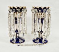 Pair of 19th century Bohemian blue overlay and clear glass table lustres with gilt decoration and