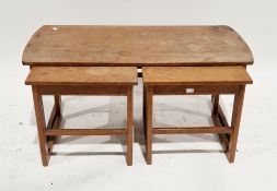 Mid-century Danish inspired teak nest of coffee tables comprising a long table over a pair of