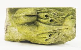 Antique sandstone architectural segment, possibly a corbel, the top carved with a scrolling leaf,