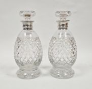 Pair of George V hobnail cut glass decanters with silver collars, Birmingham 1930, Hukin & Heath,