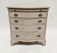 Mahogany serpentine fronted bachelor's chest in the George III-style, later painted grey, comprising