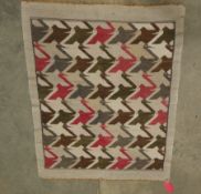 Cream ground rug with six rows of seven stylised birds, single cream border, 142cm x 166cm