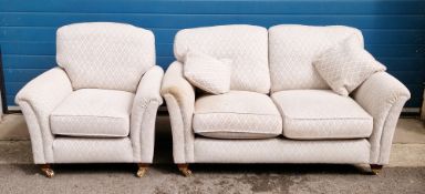 Parker Knoll two-seater sofa and matching armchair upholstered in a grey and beige pattern fabric,