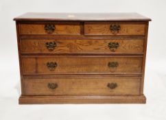 Early 20th century oak chest of drawers, the rectangular top with thumbmould edge over two short and