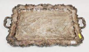 Silver plated serving tray of rectangular form with moulded foliate scrolling rim and twin