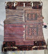 Eastern red ground saddle bag, each half with six hooked lozenges, geometric and stylised animal