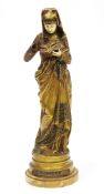 Albert Ernest Carrier-Belleuse (1814-1887), gilt bronze figure, La Liseuse, a standing woman dressed