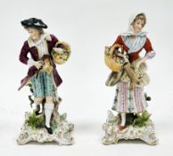 Pair of German porcelain figures, late 19th century, underglaze blue cross marks, painter's