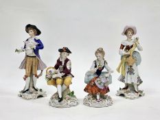 Two pairs of Sitzendorf porcelain figures, late 19th/early 20th century, printed blue crowned S