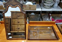 Early 20th century walnut framed mirror in the Queen Anne-style, with shaped top and easel back,