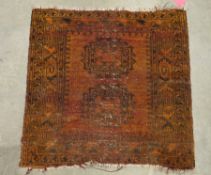 Square green ground rug with two central hooked elephant's foot guls, multiple geometric borders,