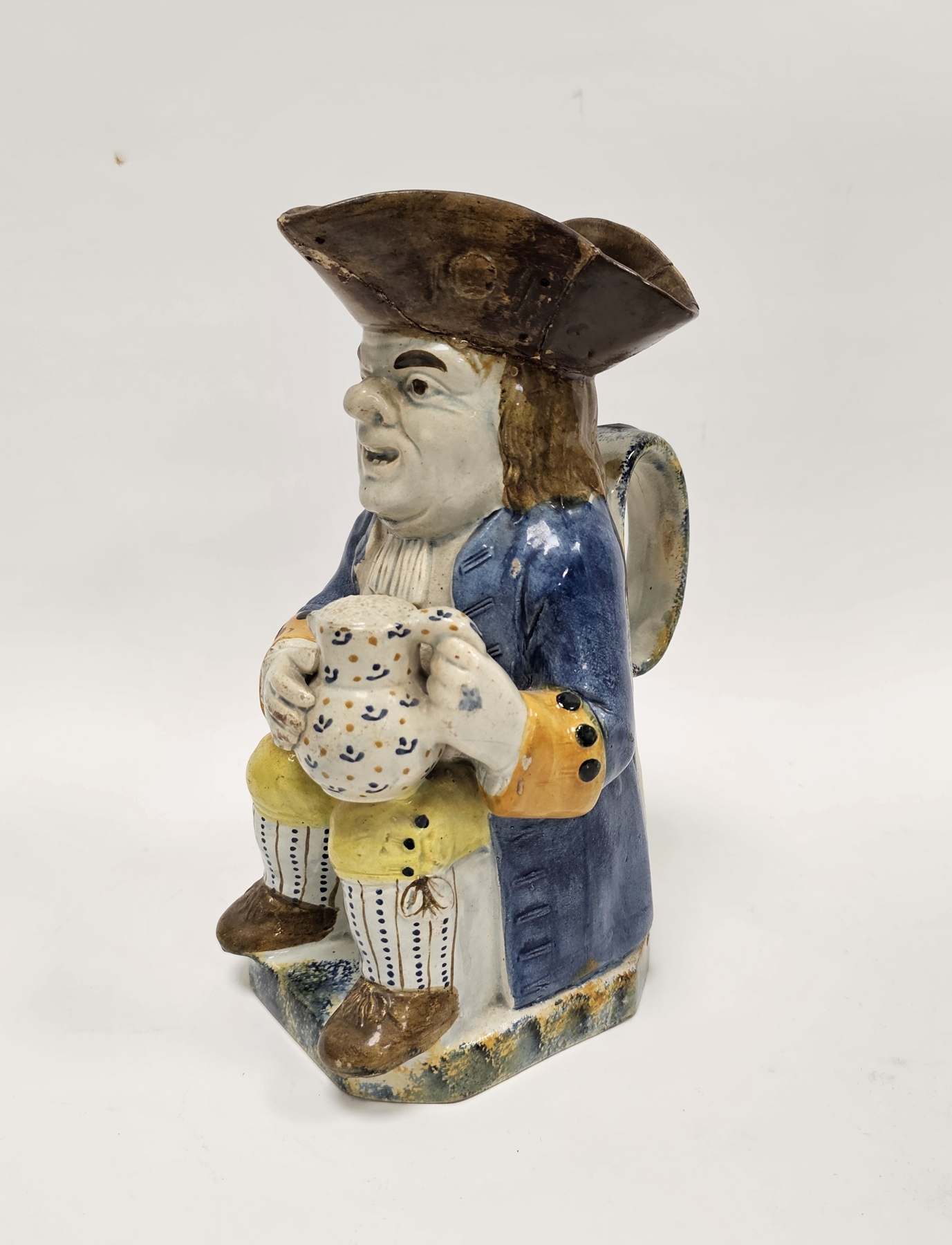 English Prattware Toby jug and cover, circa 1820, modelled seated holding a jug of foaming ale - Image 7 of 10