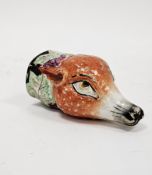 Staffordshire pottery fox-shaped stirrup cup, circa 1820, moulded with purple fruiting vine and