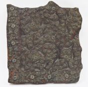 South East Asian printing block having a pattern of metal flowers and foliage on a hardwood base,