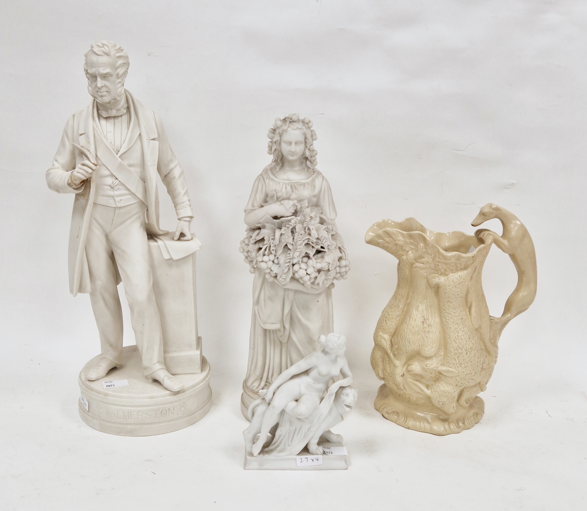 Hill Pottery Company (Burslem) parian figure of Palmerston, standing beside an inscribed column,