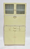 Mid-century retro Hygena pale yellow and white kitchen larder cupboard comprising two glazed