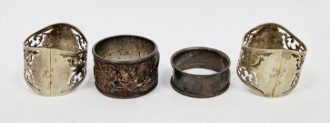 Victorian silver napkin ring, a pair of pierced silver plated napkin rings and a Chinese metal