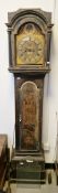 Late 18th century lacquer eight-day longcase clock with arched brass dial signed Wm Skeggs,