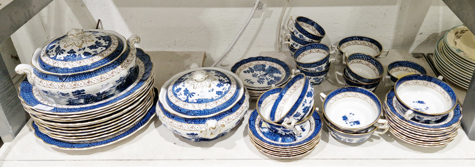 Booths Real Old Willow pattern blue and white transfer-printed part part dinner- service, 20th