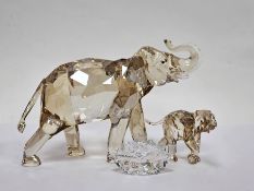 Two Swarovski crystal glass elephants including Cinta the elephant 1137207 with name plaque and