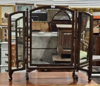 19th century triparte folding dressing table mirror, of arched rectangular form, with pinecone