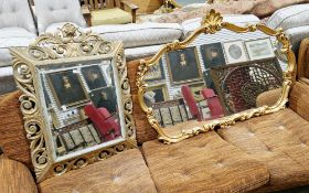 Modern gilt-framed overmantel mirror in the rococo-style, 90cm x 121cm, a modern wall mirror with