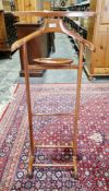 Early 20th century-style mahogany valet stand with brass mounts and on castors, 109cm high x 47cm