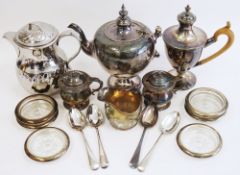 Collection of silver plate including three oval serving trays, a three-branch candelabrum, a hot