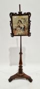 19th century rosewood pole screen, the adjustable rectangular screen having a foliate scroll moulded